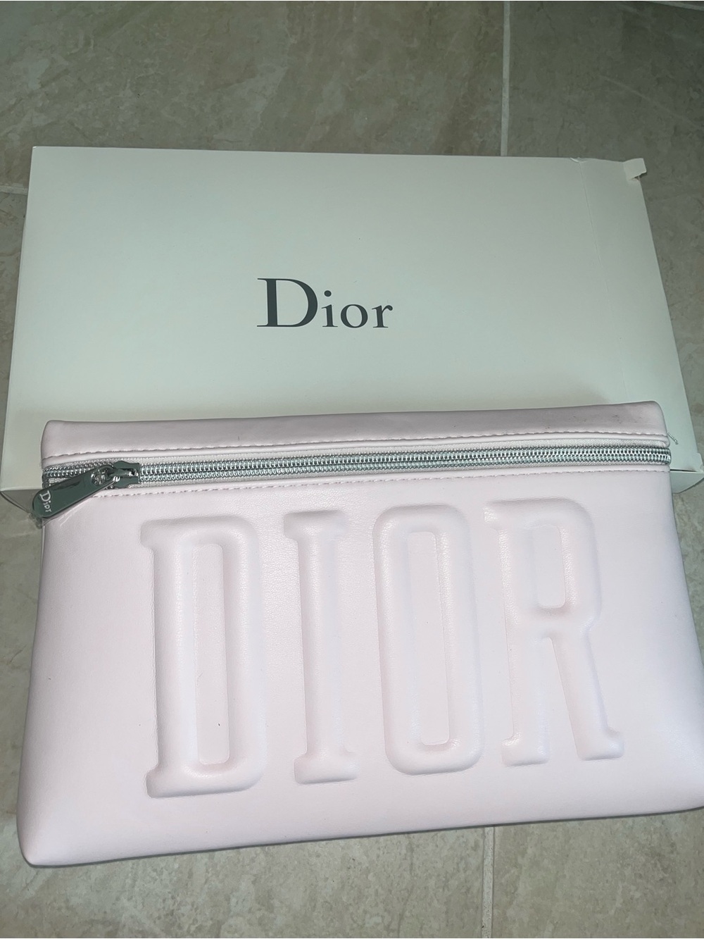 Dior Pale Pink Embossed Logo Leather Clutch